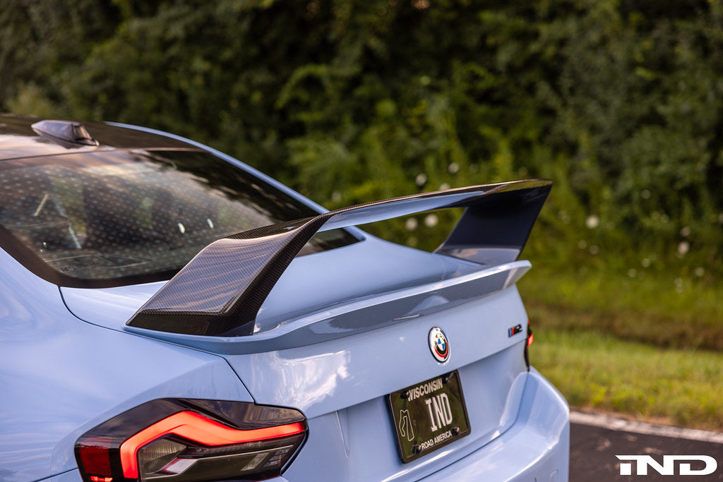 Alpha-N carbon fixed rear wing Class 3 installed on BMW G87 M2 showing motorsport carbon aero design