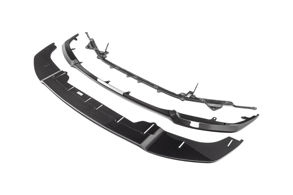 Alpha N G87 M2 Carbon adjustable front lip, Class 3, exterior car accessory with a sleek design on a white background.