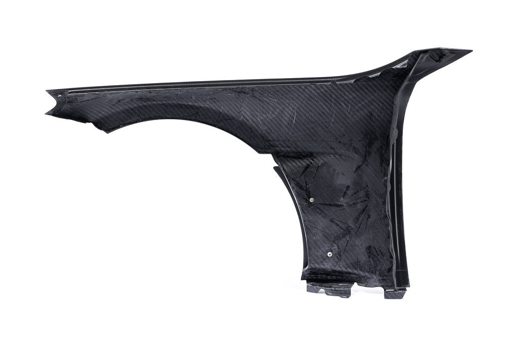 Alpha N G87 M2 Carbon front fender set with V2 blades, white background, showcasing sleek, lightweight exterior car parts.
