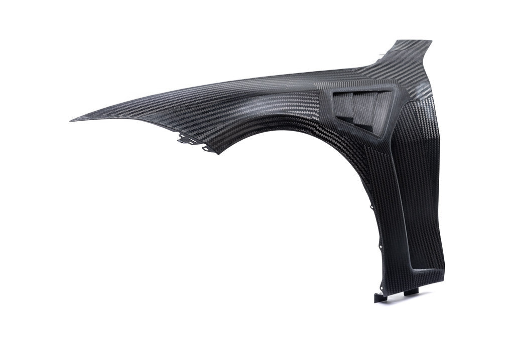 Alpha N G8X M3 M4 carbon vented front fender set for BMW G8X models, shown on white background with detailed venting features.