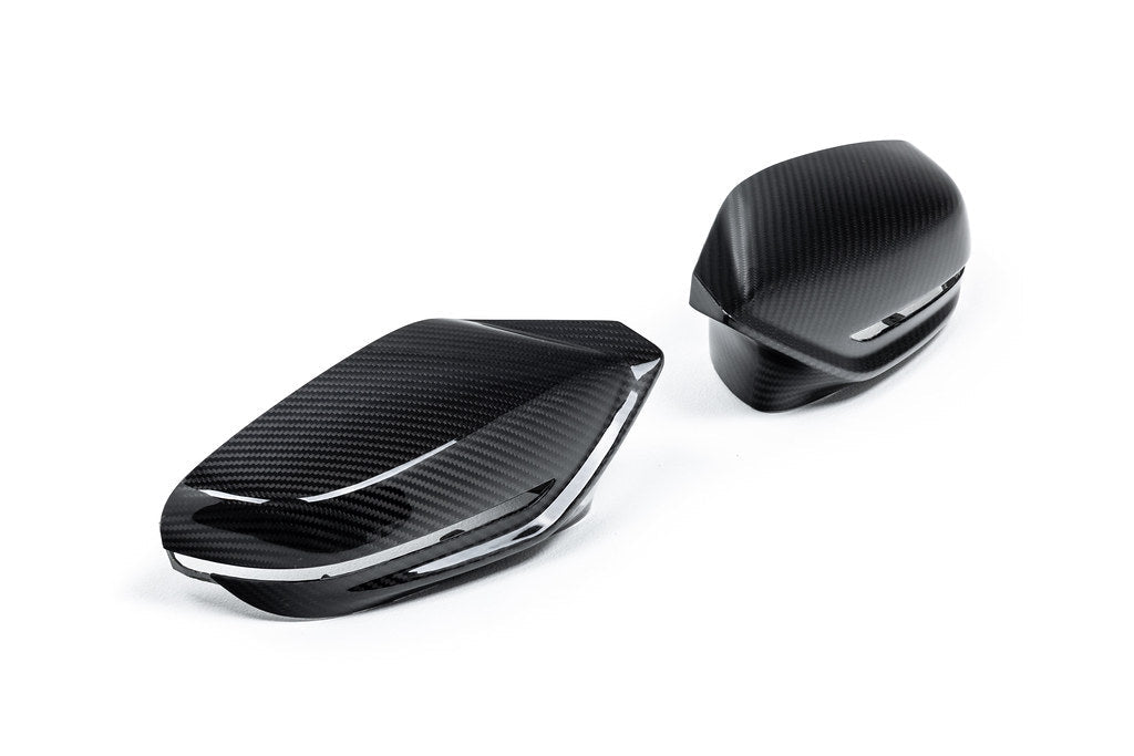 Alpha N G8X M2, M3, M4 carbon mirror cap set shown on white background, exterior automotive accessory for BMW models.