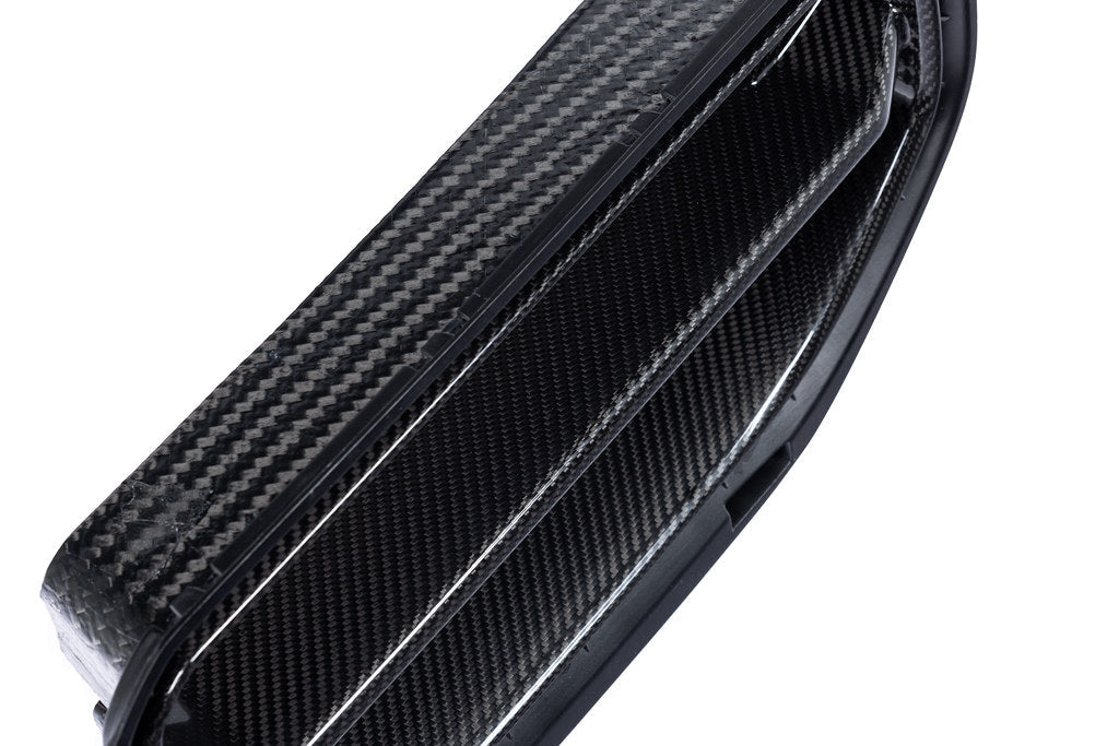 Alpha N G87 M2 carbon front grille for BMW exterior replacement, showing the sleek, black carbon fiber design on a vehicle.