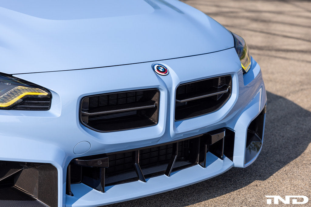 Alpha N G87 M2 carbon front grille for BMW exterior upgrade, featuring sleek black design and precise fit on the vehicle.