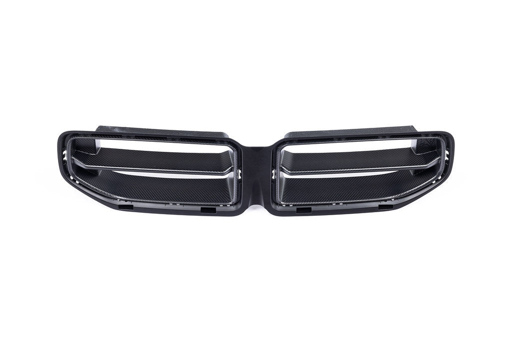 Alpha N G87 M2 carbon front grille for BMW exterior, showcasing the sleek, textured carbon design on a sporty vehicle.
