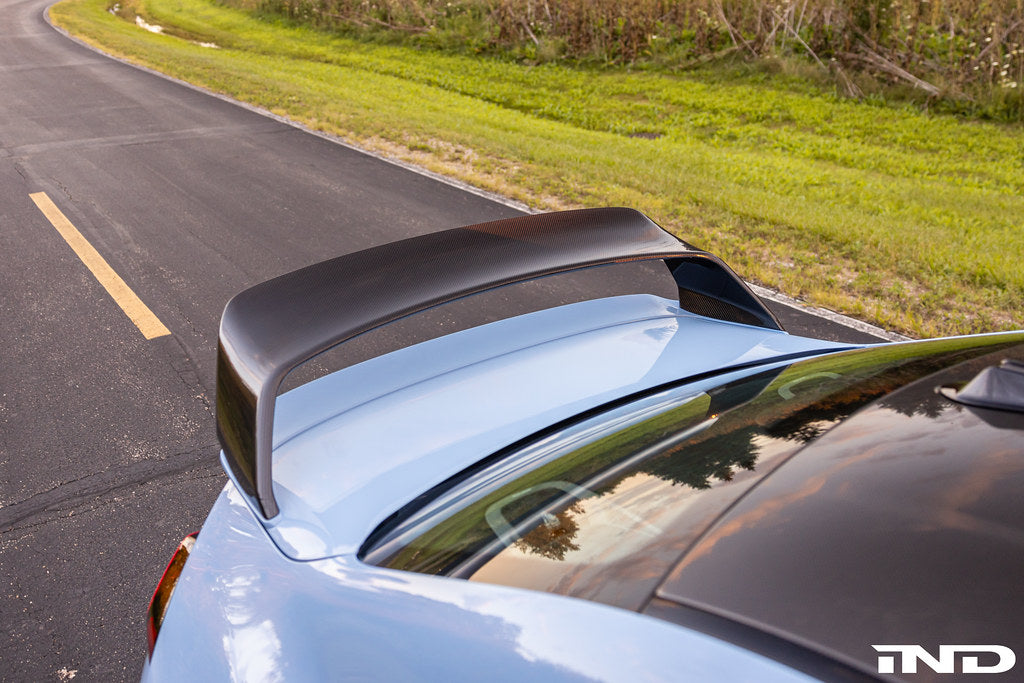 Alpha-N carbon fixed rear wing Class 3 installed on BMW G87 M2 showing motorsport carbon aero design