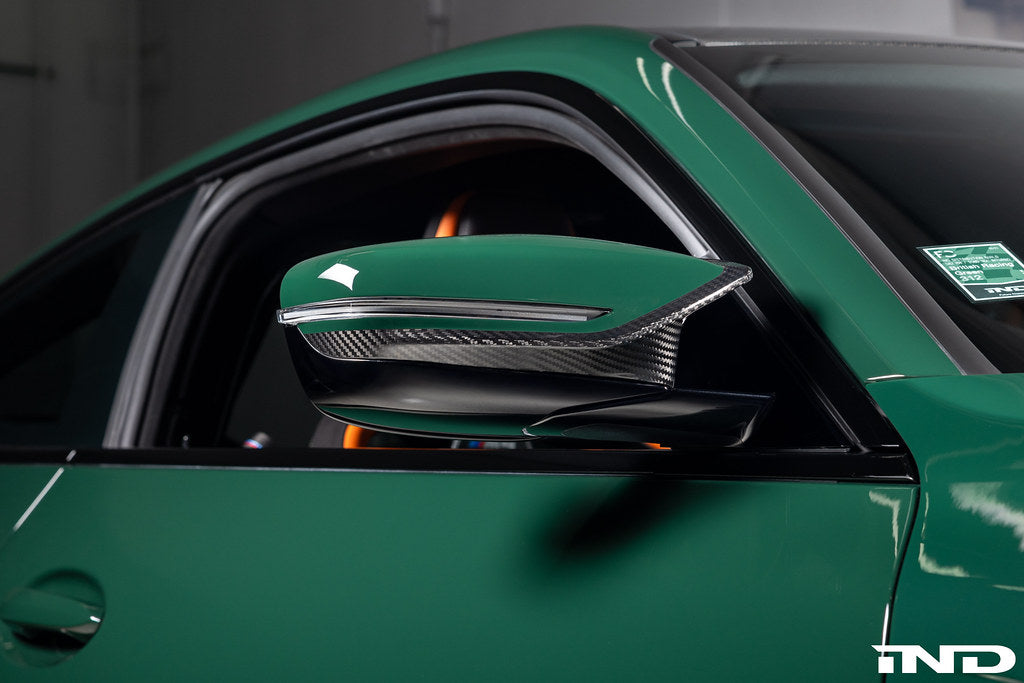 Alpha N G8X M2 M3 M4 carbon mirror cap set for exterior side mirrors on BMW models, showcasing sleek black finish.