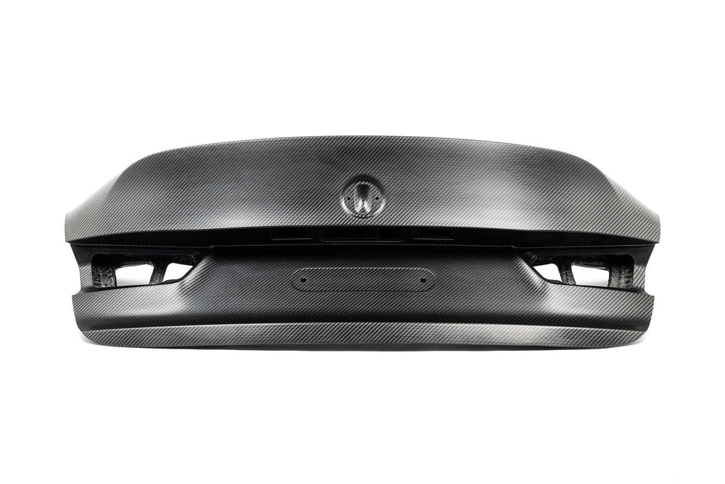 Alpha N G80 M3 Carbon CSL trunk lid installed on white background, showcasing sleek exterior design and lightweight carbon fiber material.