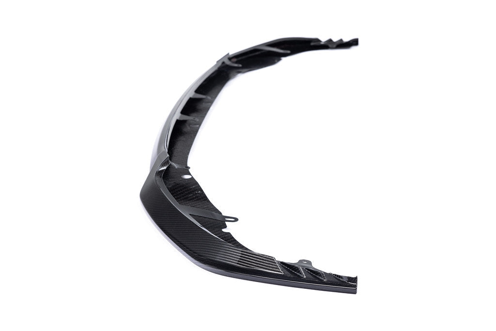 Alpha N G87 M2 Carbon Clubsport front lip exterior accessory installed on a white background.