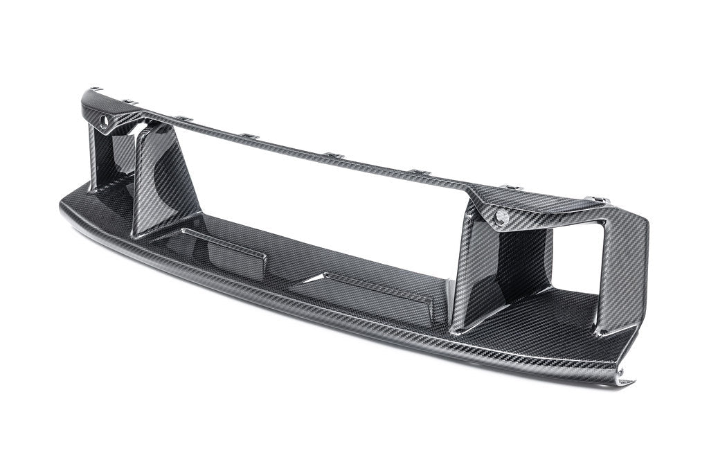 Alpha N G87 M2 carbon front center bumper trim installed on a white background, showcasing sleek exterior car detailing.