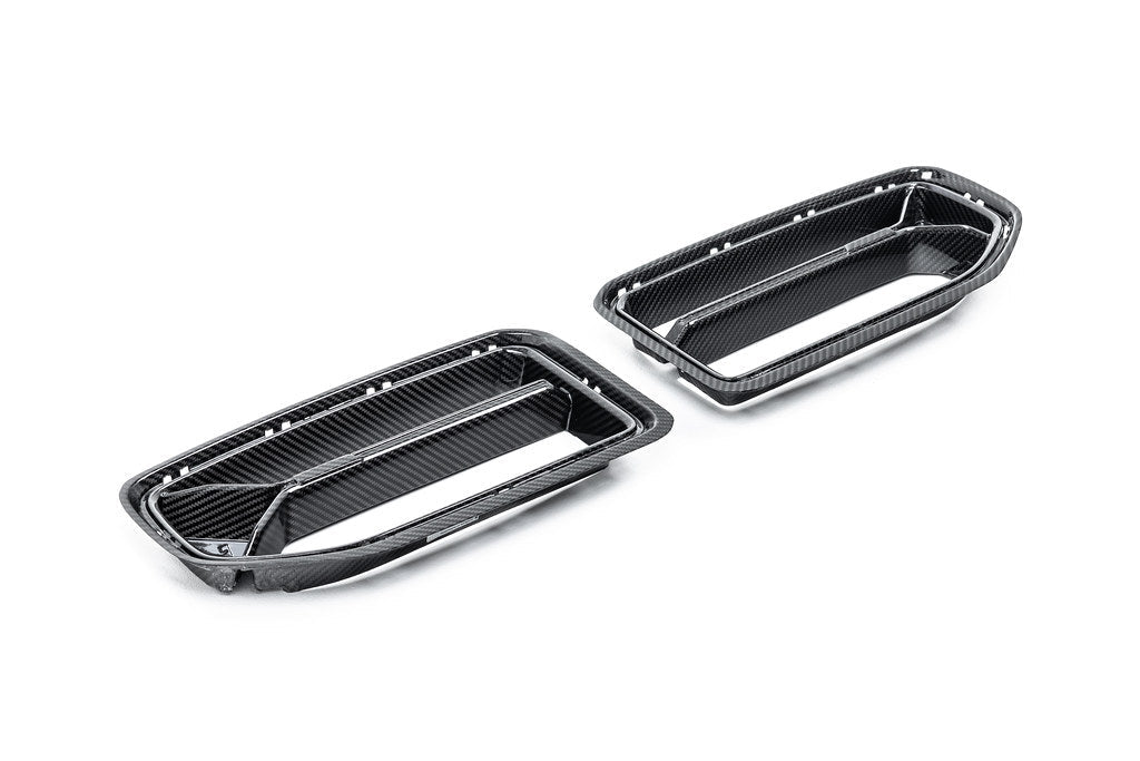 Alpha N G87 M2 Carbon front grille V2 for BMW G87 M2, showcasing sleek white finish and detailed exterior design.