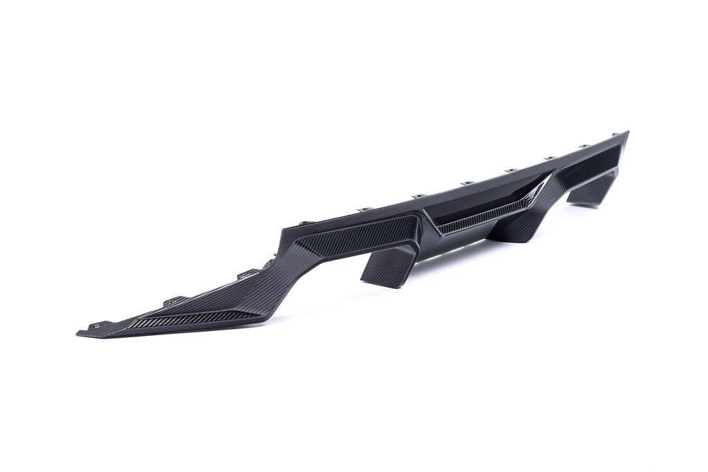 Alpha N G87 M2 carbon rear diffuser mounted on a white background, showcasing its sleek aerodynamic design for BMW M2.