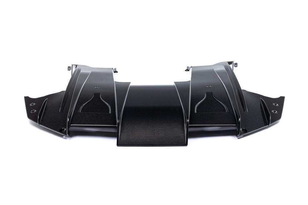 Alpha N G87 M2 carbon rear underbody floor kit installed on a white background, showcasing its sleek aerodynamic design.