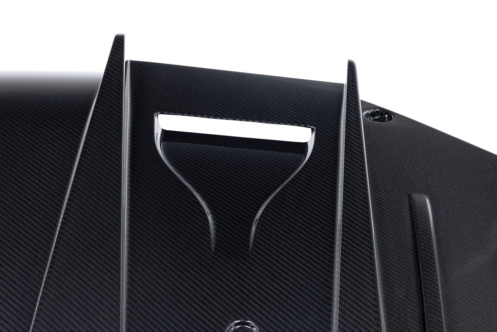 Alpha N G87 M2 carbon rear underbody floor kit installed on a BMW M2, showcasing lightweight aerodynamic exterior upgrade.