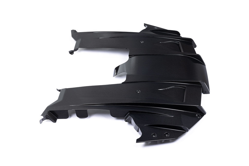 Alpha N G87 M2 carbon rear underbody floor kit installed on a white background, showcasing its aerodynamic design and lightweight construction.
