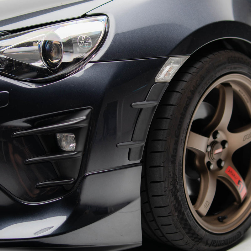 TRD V2 Style Front Bumper Lip For 1993-1998 Toyota Supra - Unpainted Black Polyurethane