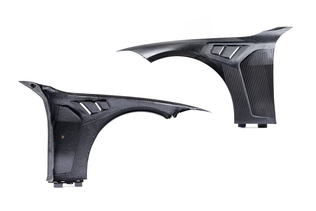 Alpha N G8X M3 M4 carbon vented front fender set for BMW, exterior car body parts with a sleek, aerodynamic design.