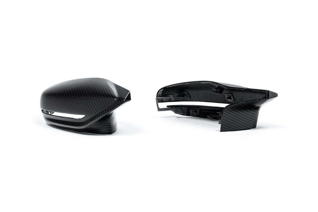 Alpha N G8X M2/M3/M4 carbon mirror cap set shown on white background, exterior car accessory for BMW G8X series.