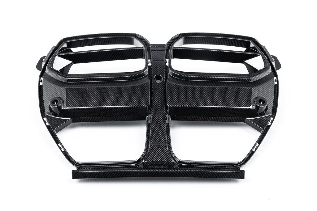 Alpha N G8X M3 M4 carbon front grille for BMW, exterior view showcasing sleek, lightweight design with carbon fiber finish.